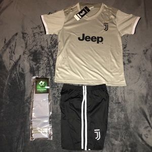 Boys Ronaldo fan jersey, shorts, and socks.